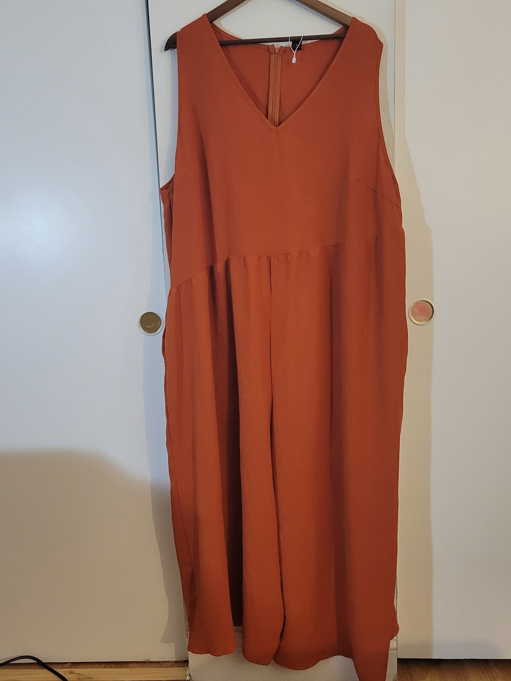 Emery Rose V-Neck Sleeveless Jumpsuit in Rust Orange